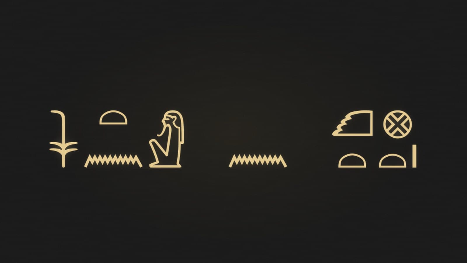 The Egyptian phrase the king of Egypt written in hieroglyphs, rendered in gold