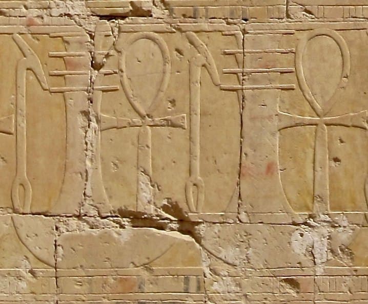 Wall frieze of alternating ankh, djed and was signs in the Hathor chapel of Hatshepsut's temple