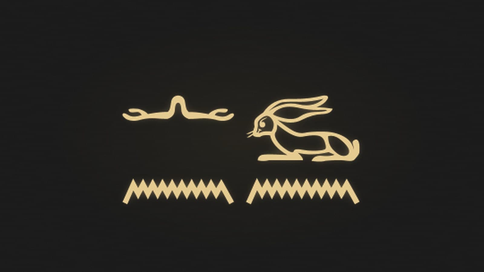 The Egyptian phrase there is nothing written in hieroglyphs, rendered in gold