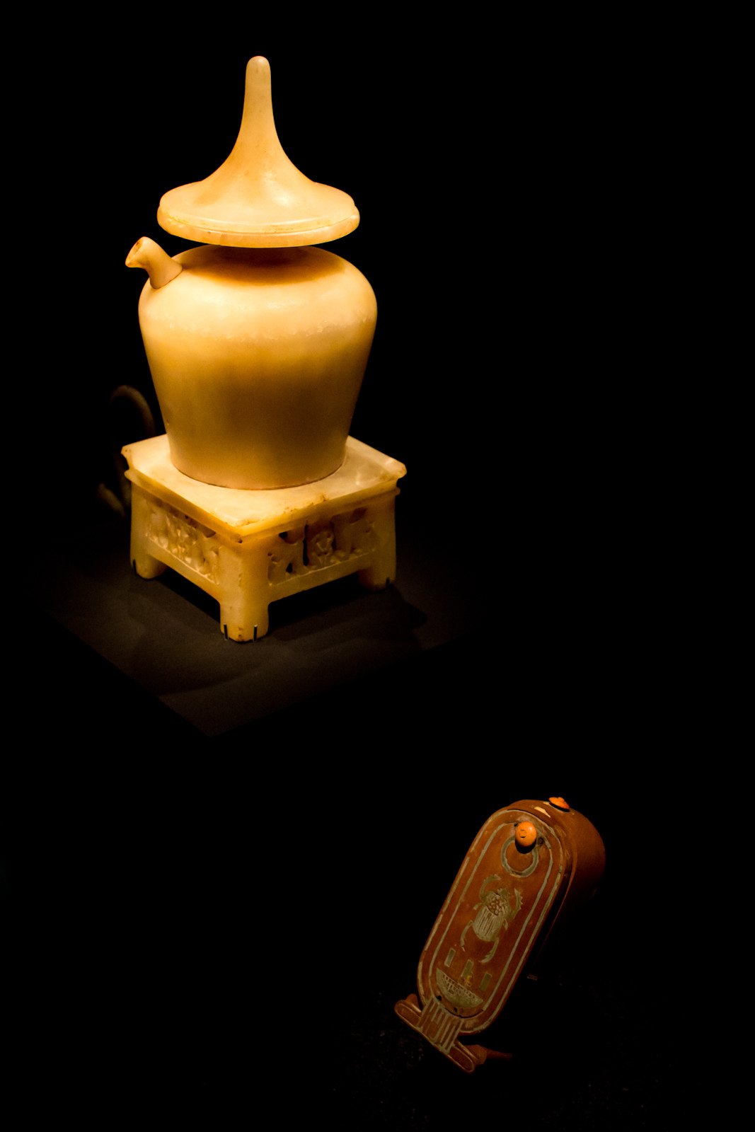 Alabaster ewer and cartouche-shaped box from the tomb of Tutankhamun